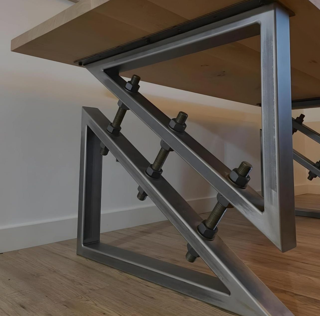 Workshop interior at The High Road Manufacturing showing equipment and completed project components