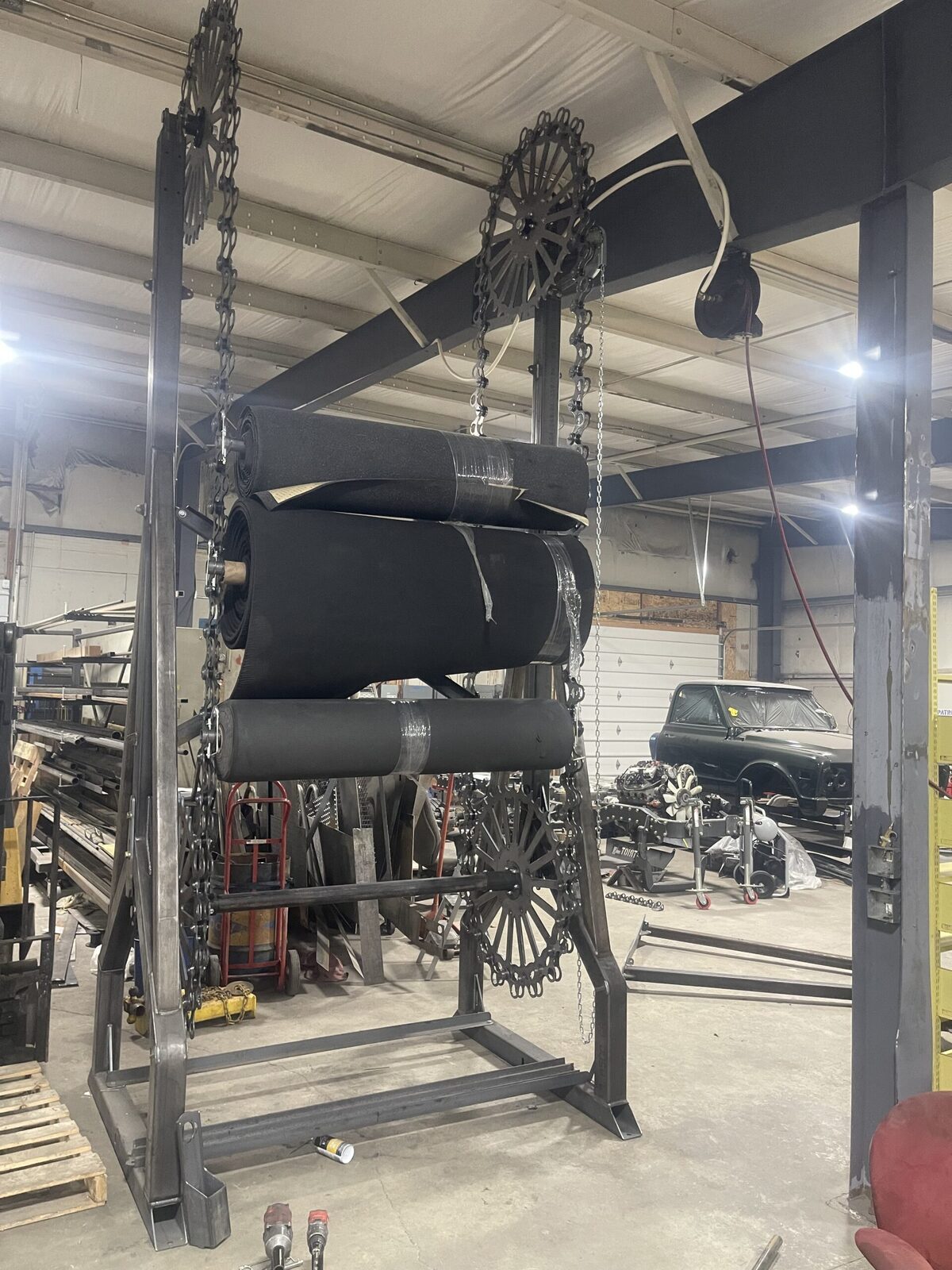 Production area at The High Road Manufacturing facility with fabrication projects in progress